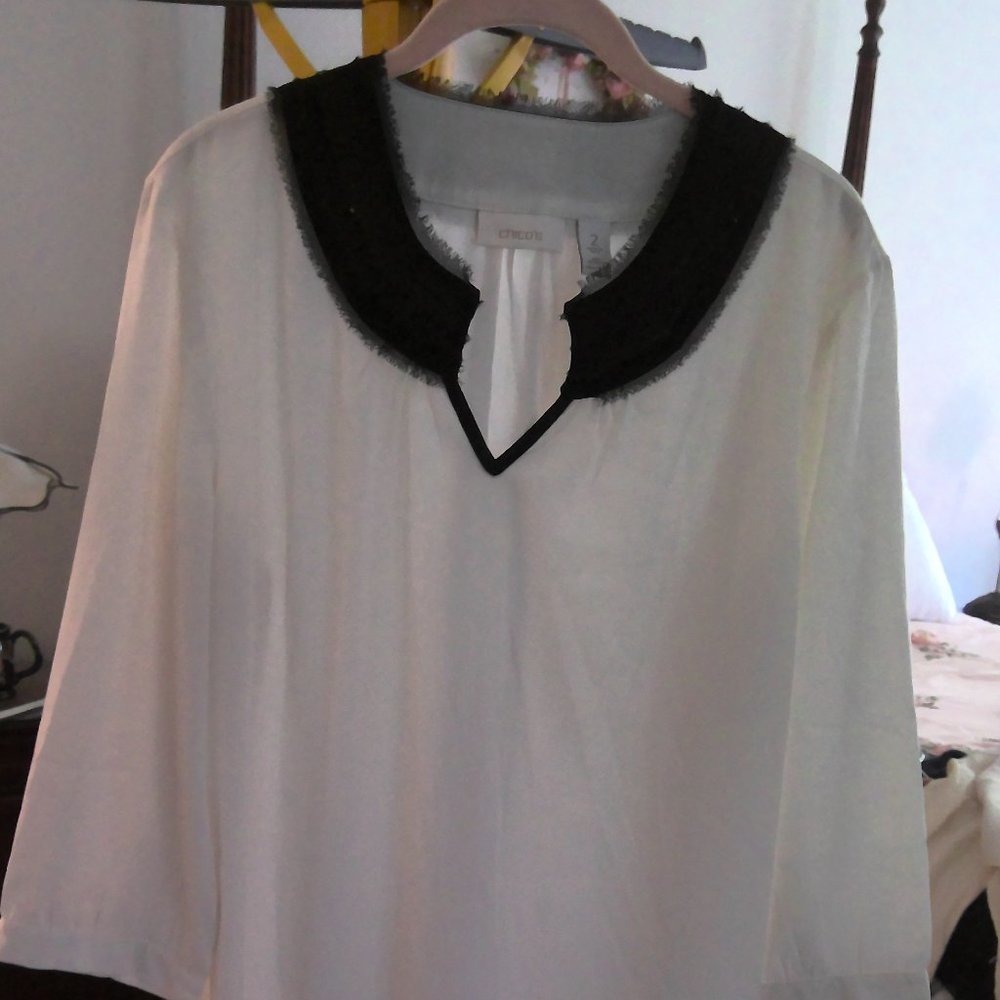 Cream and black long sleeve blouse